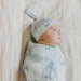 Copper Pearl Empire Top Knot Hat