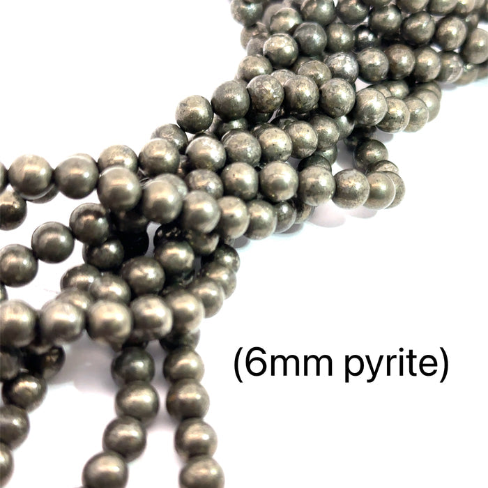 One Pyrite 6mm smooth round 16'' Gemstone strand