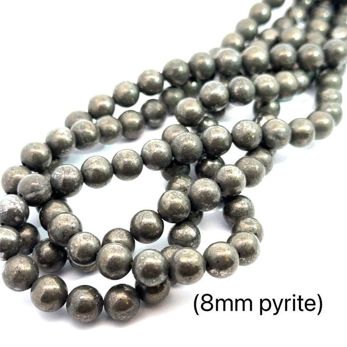 One Pyrite 8mm smooth round  gemstone strand