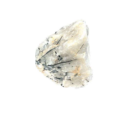 An Extra large raw tourmalinated moonstone specimen 4 pounds with black tourmaline needles through pearlescent white moonstone on a white background, front view.
